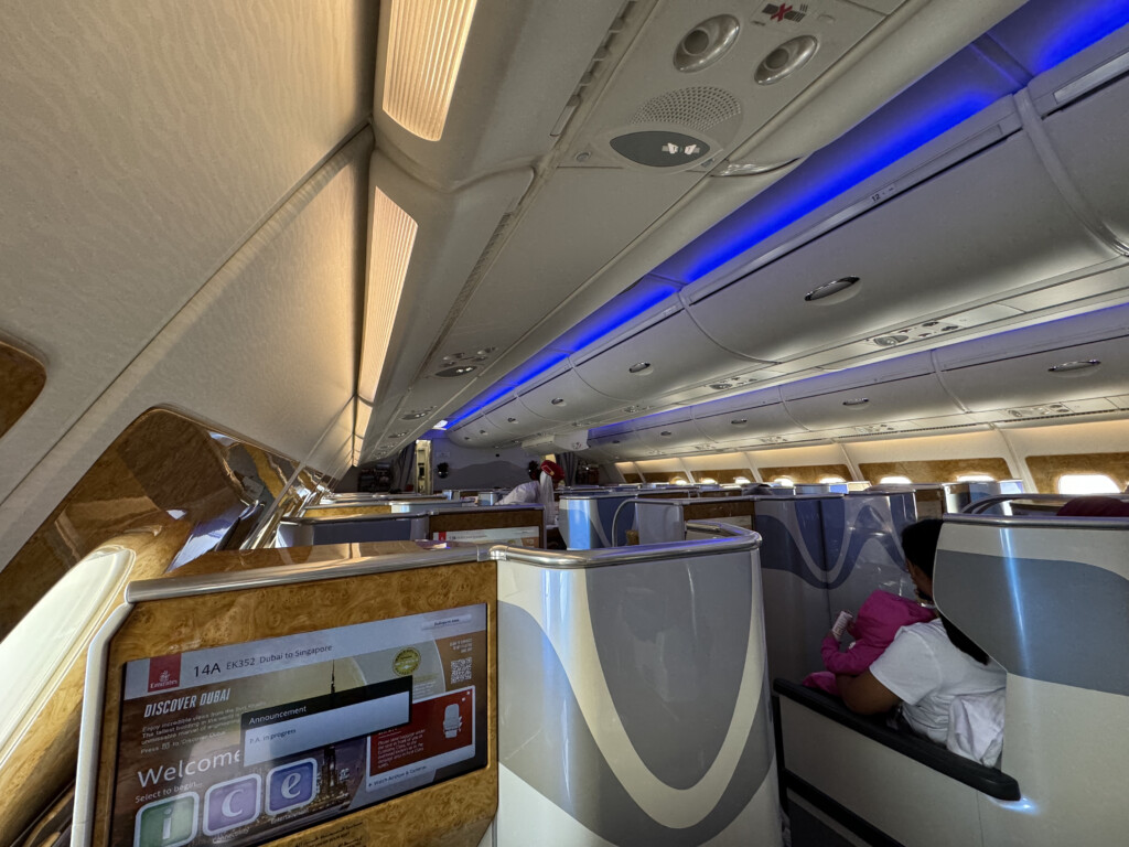a person sitting in a chair on an airplane