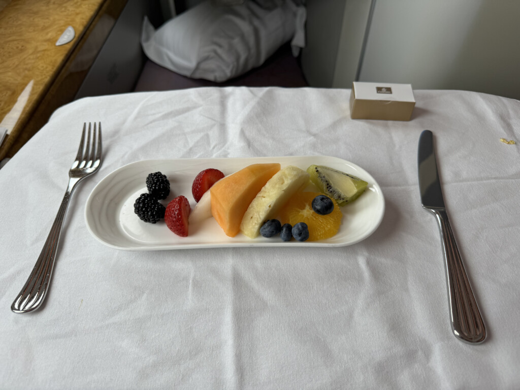 a plate of fruit on a table