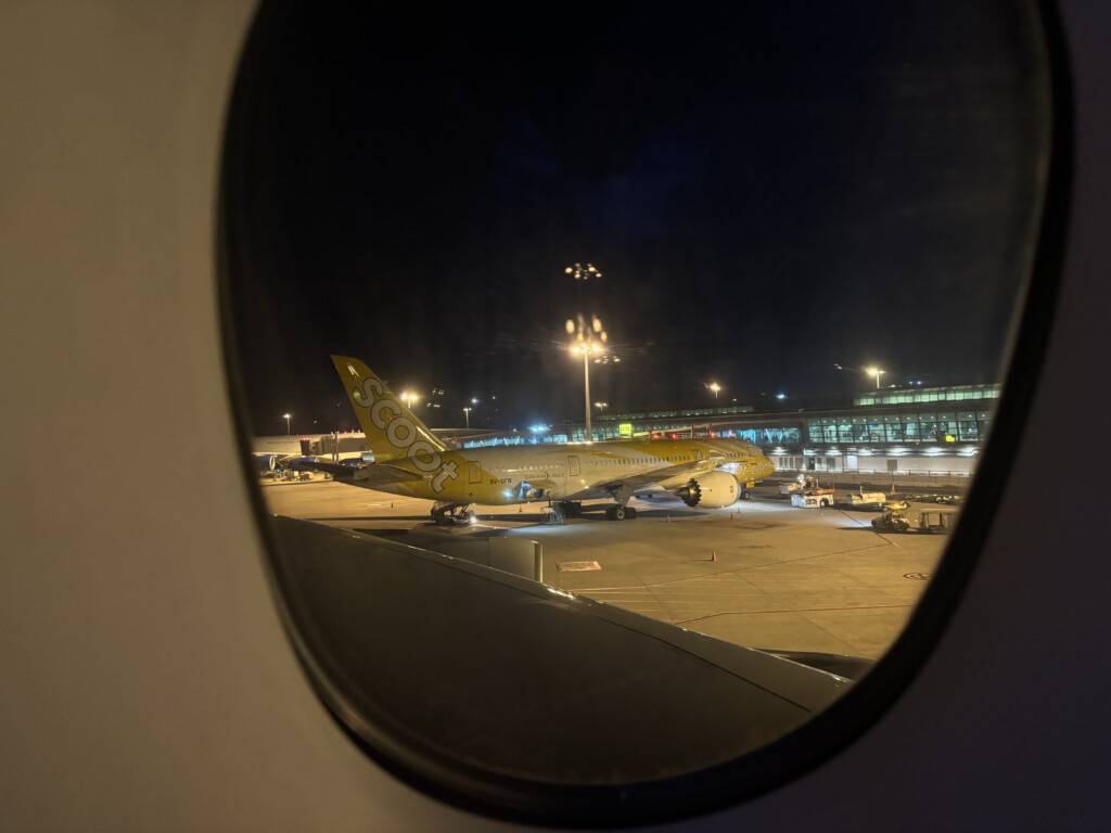 a plane on the tarmac at night