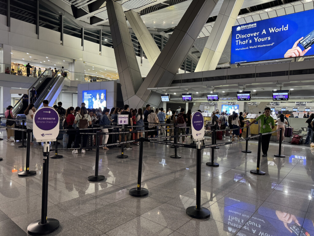 a group of people in a terminal