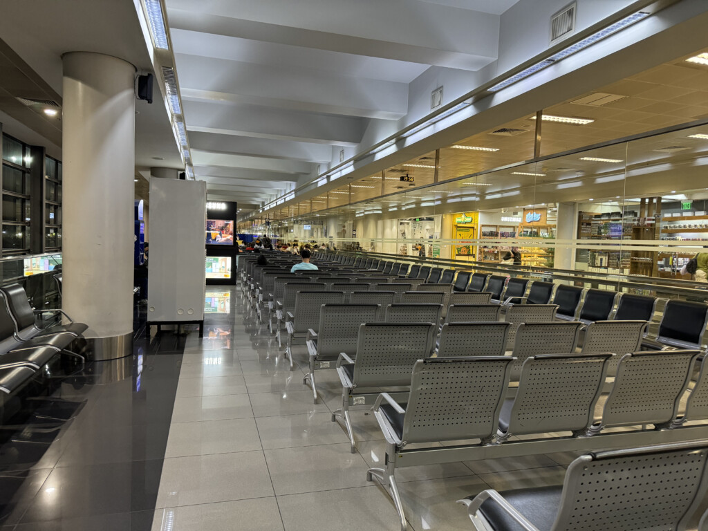 a row of chairs in a terminal