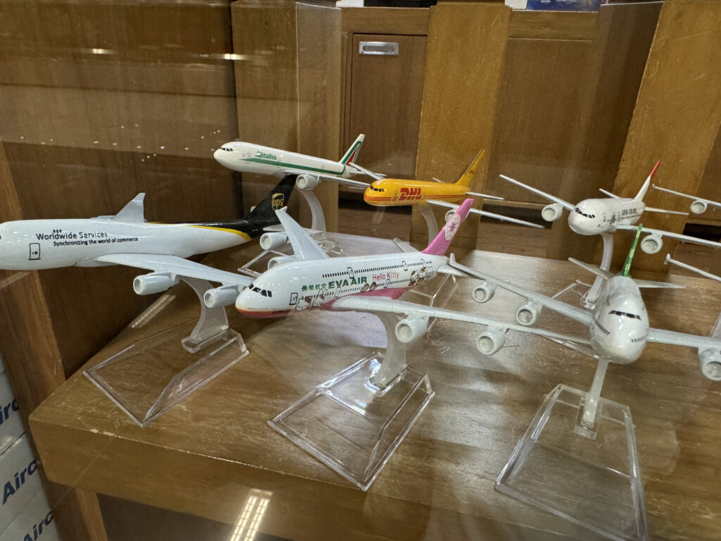 a group of model airplanes on display