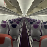 rows of seats in an airplane