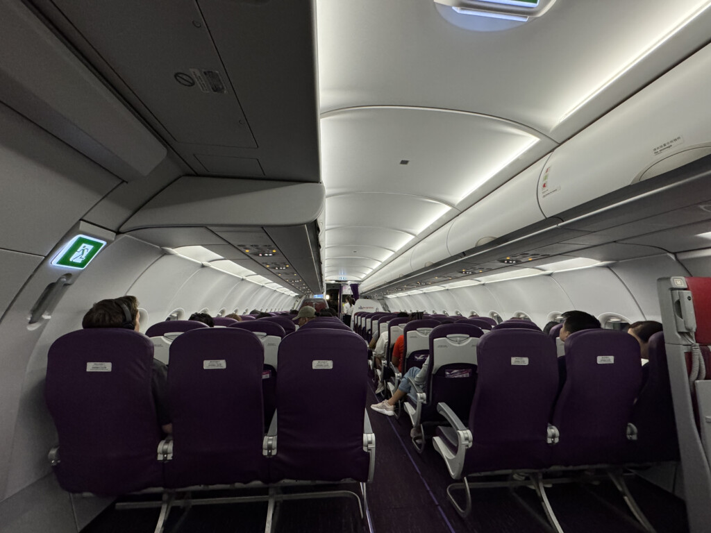 a plane with purple seats