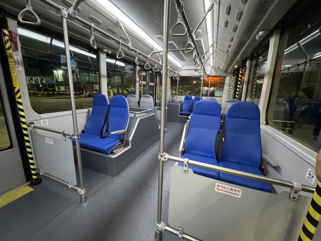 a blue seats on a bus