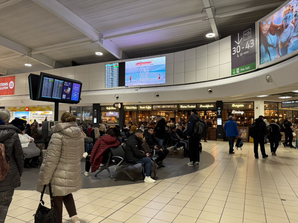 a group of people in a terminal