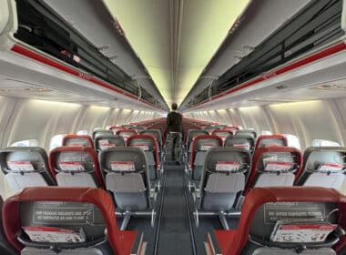 a man standing in an airplane