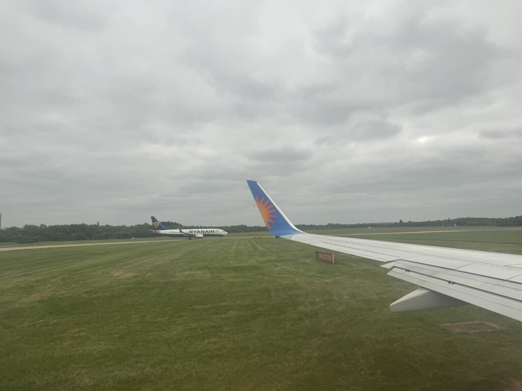 an airplane wing on a runway