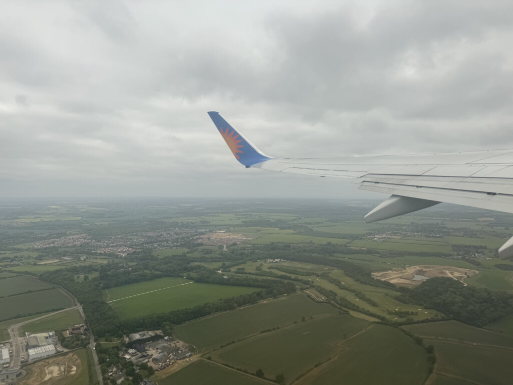 an airplane wing in the sky