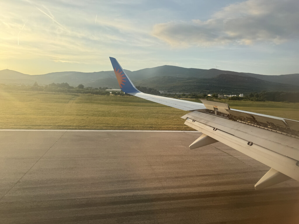an airplane wing on a runway