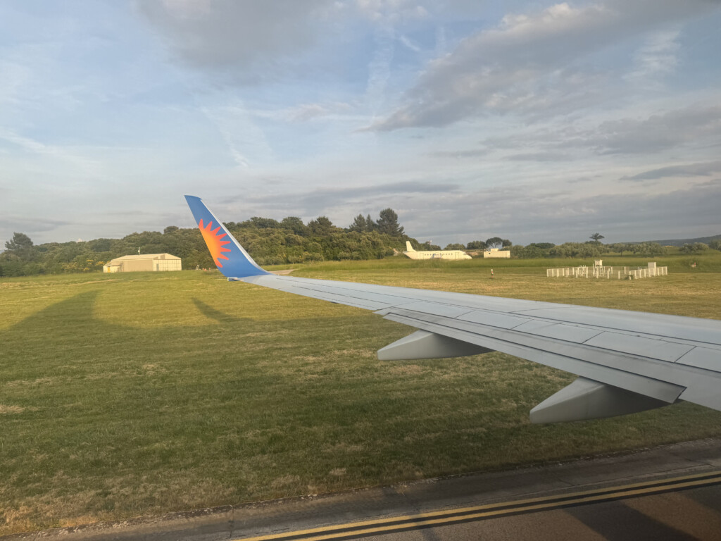 an airplane wing on a runway