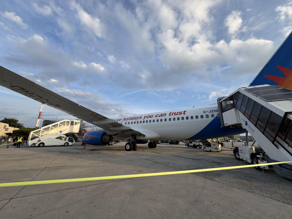 an airplane parked on a tarmac