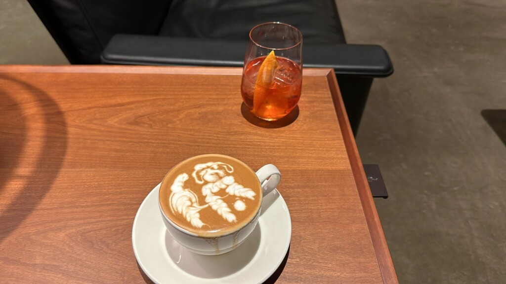 a cup of coffee with a foamy foam on top of it