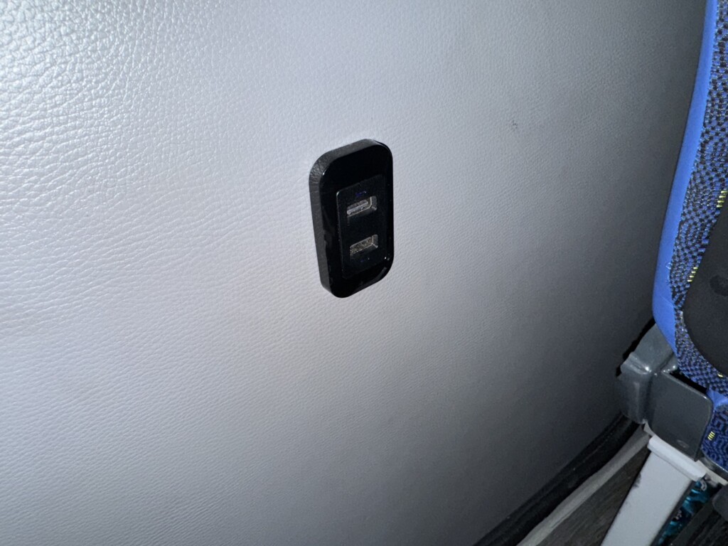 a black usb plug on a white wall