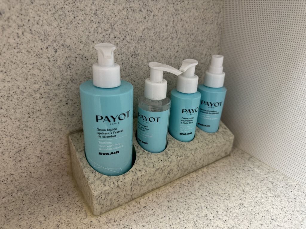 a group of blue bottles on a counter
