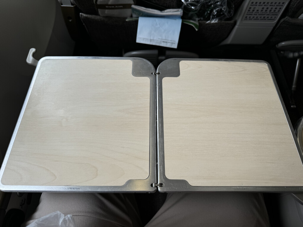 a wooden tray on a person's lap