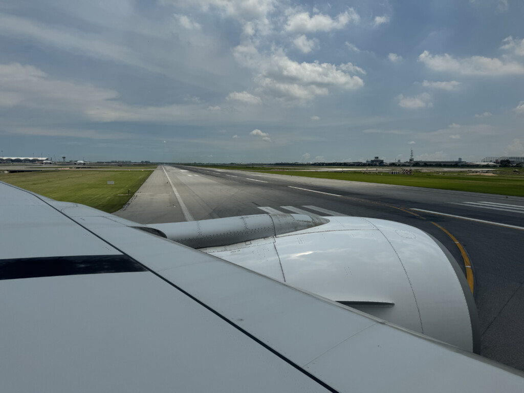 an airplane wing on a runway