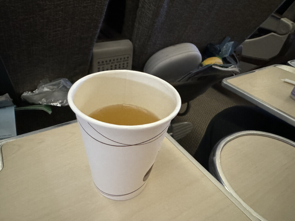 a cup of liquid on a table