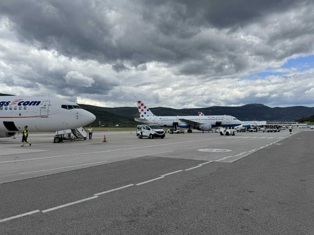 airplanes parked on a runway