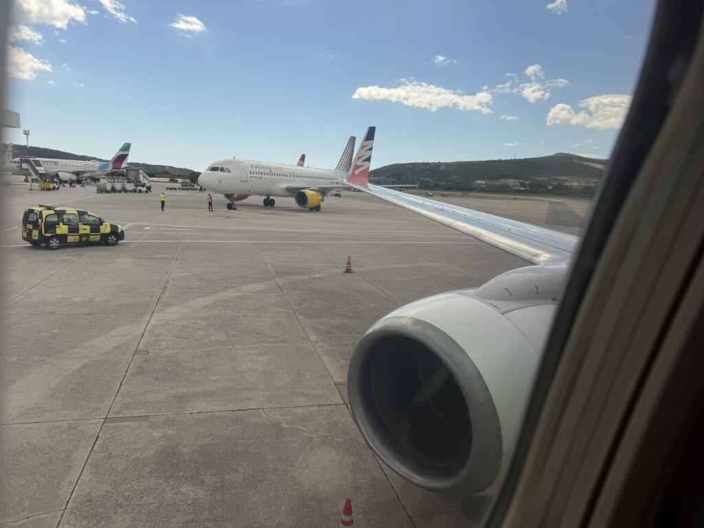 an airplane wing on a runway
