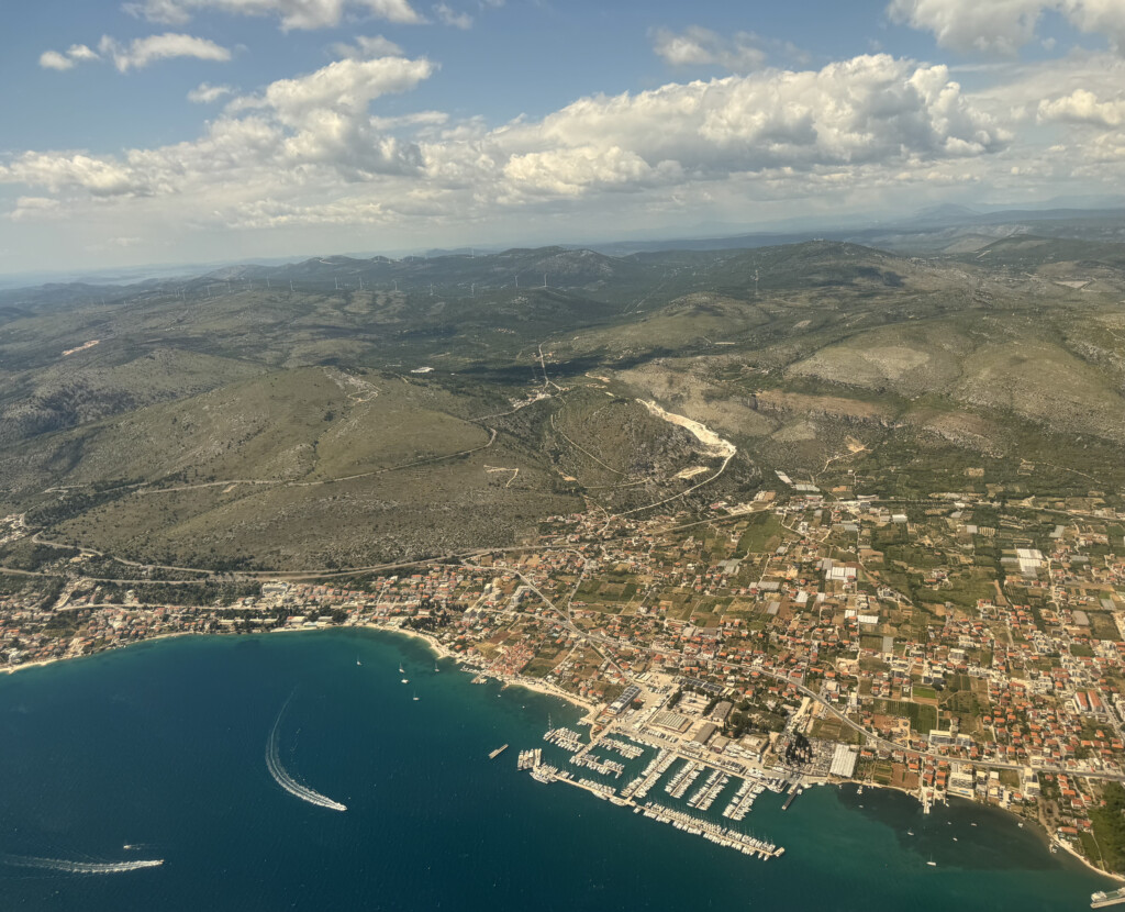 aerial view of a city and a body of water