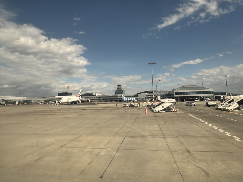 an airport with airplanes on the ground