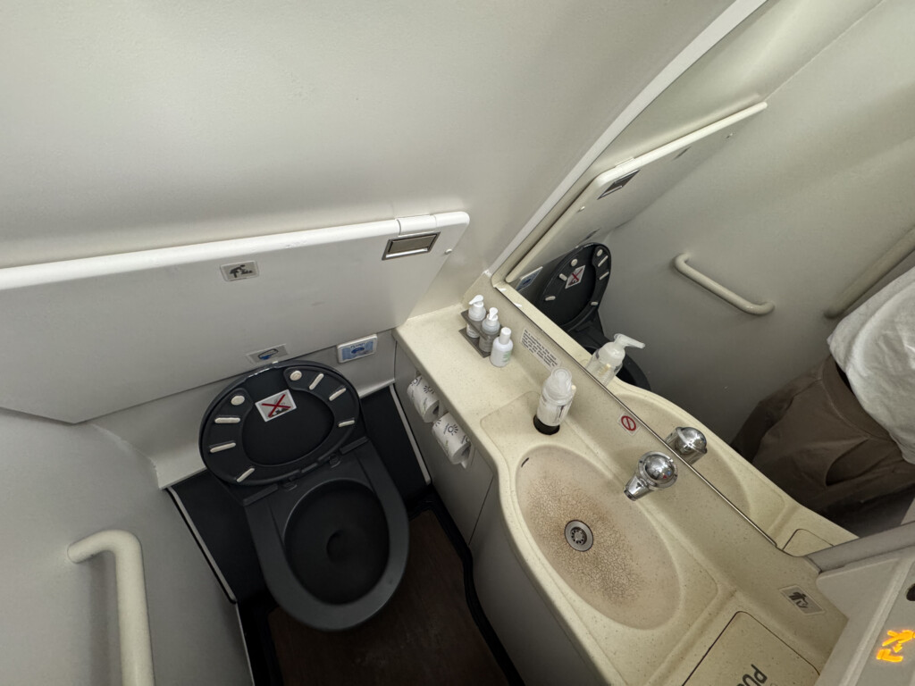 a bathroom with a toilet and sink