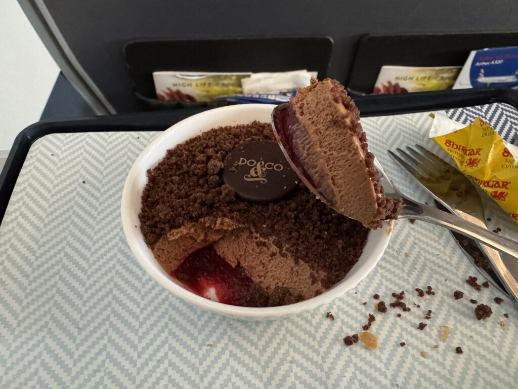 a bowl of dessert with a fork