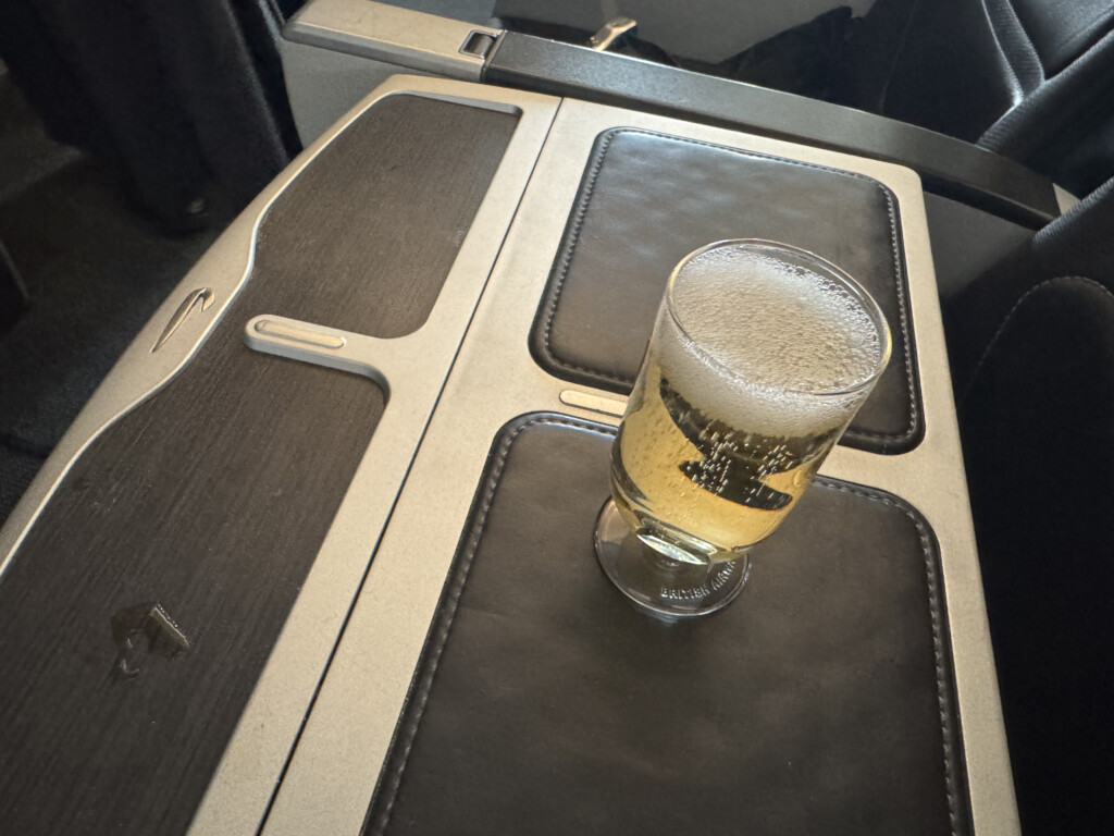 a glass of beer on a table