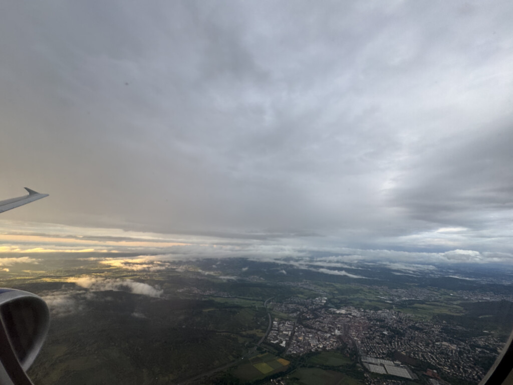 aerial view of a city and clouds