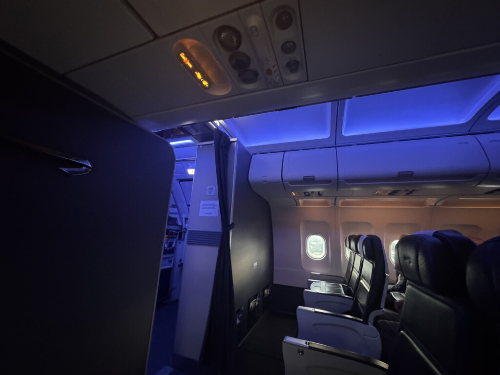an airplane with seats and lights
