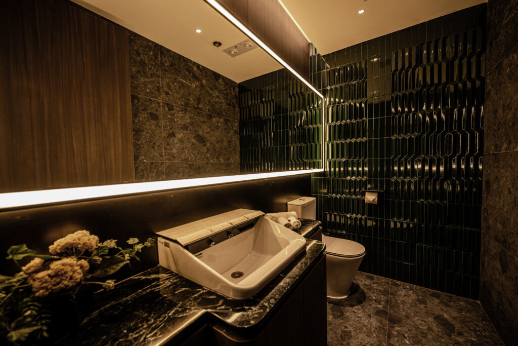 a bathroom with a mirror and sink
