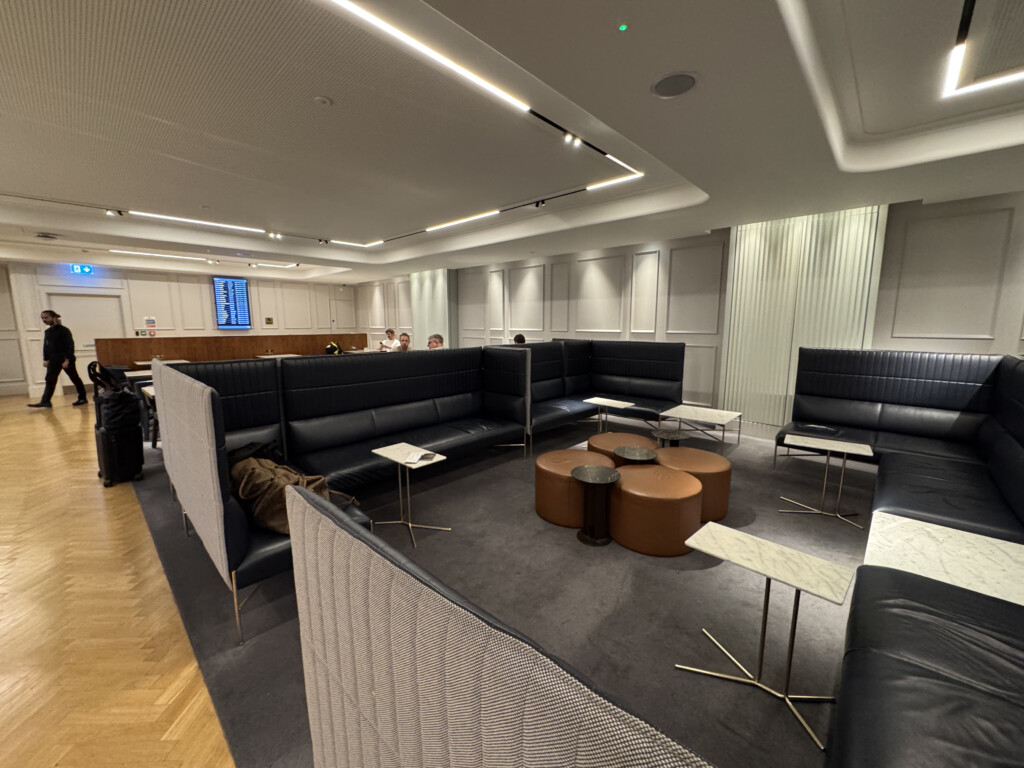 a room with a couch and tables