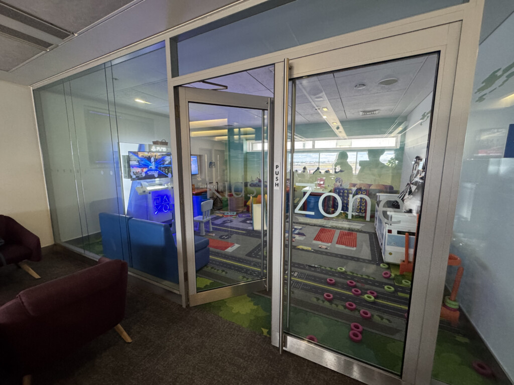 a glass doors with a video game room