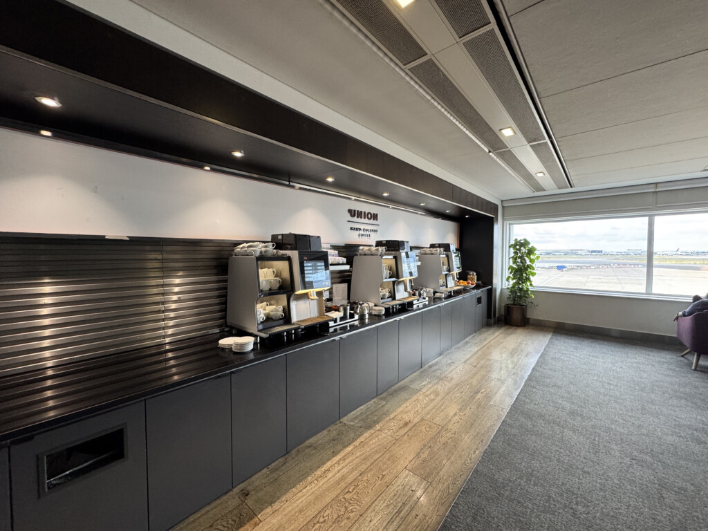 a room with a window and a few coffee machines