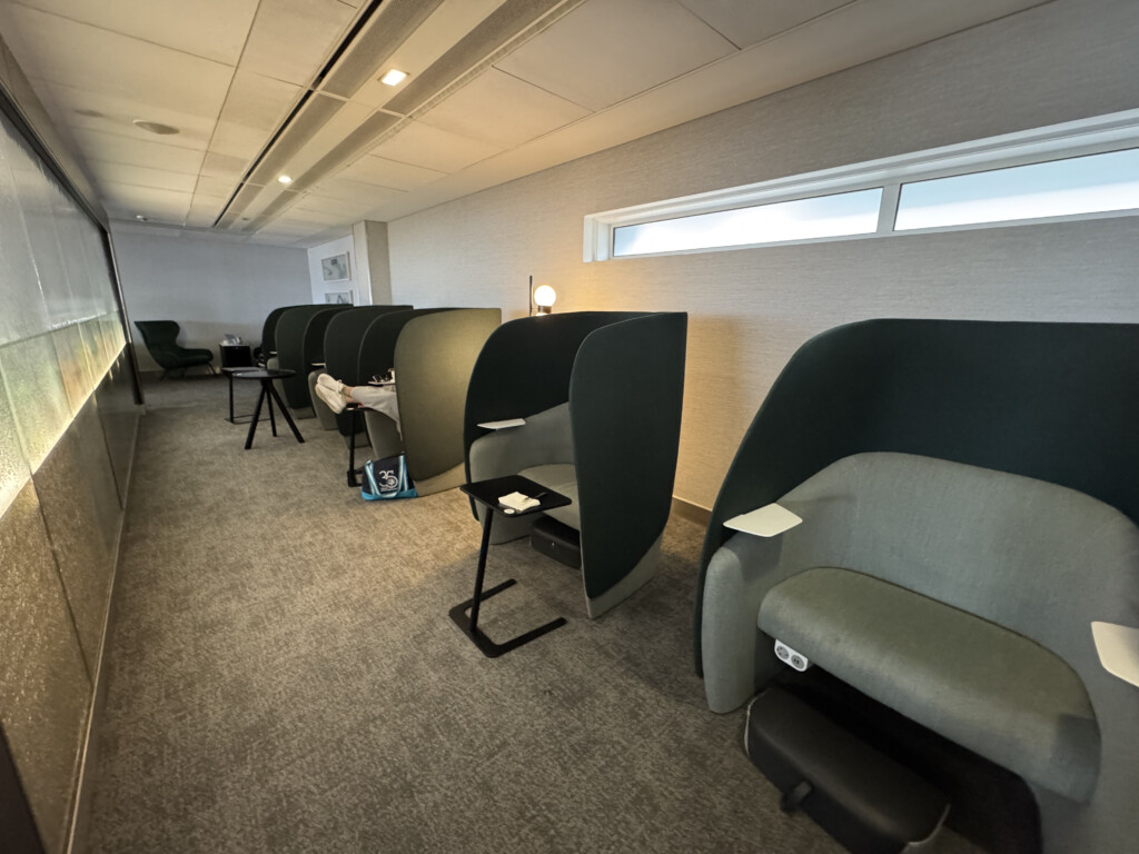 a room with chairs and tables