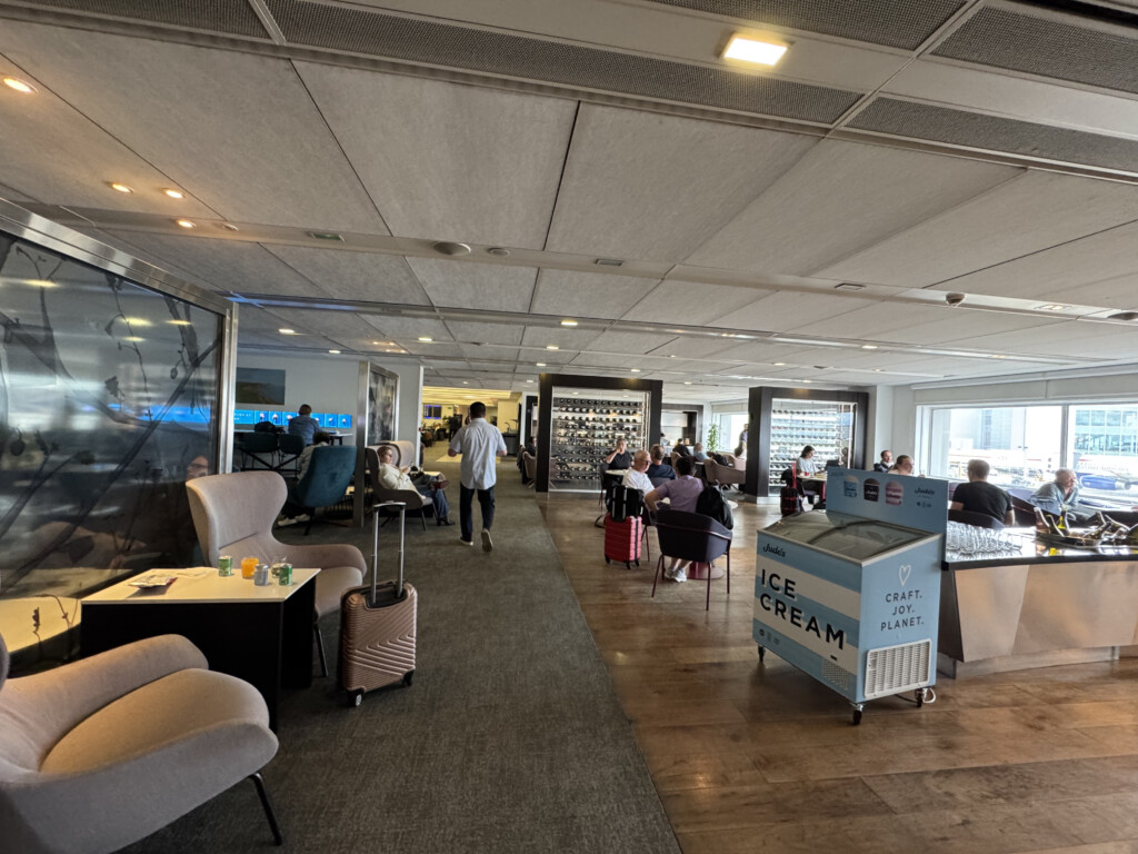 a room with people sitting and waiting area