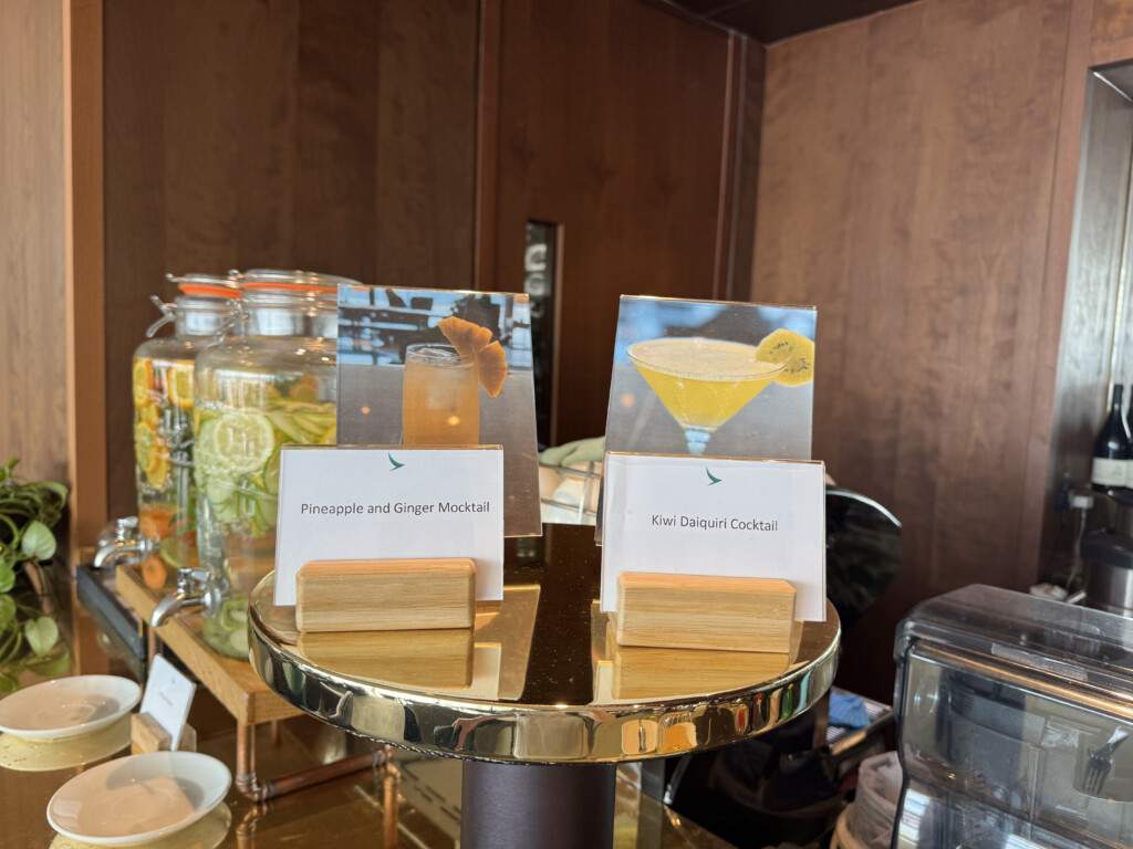 cards on a table with drinks in jars