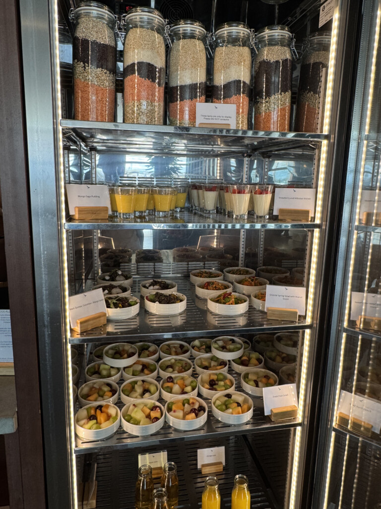 a display case with food in containers