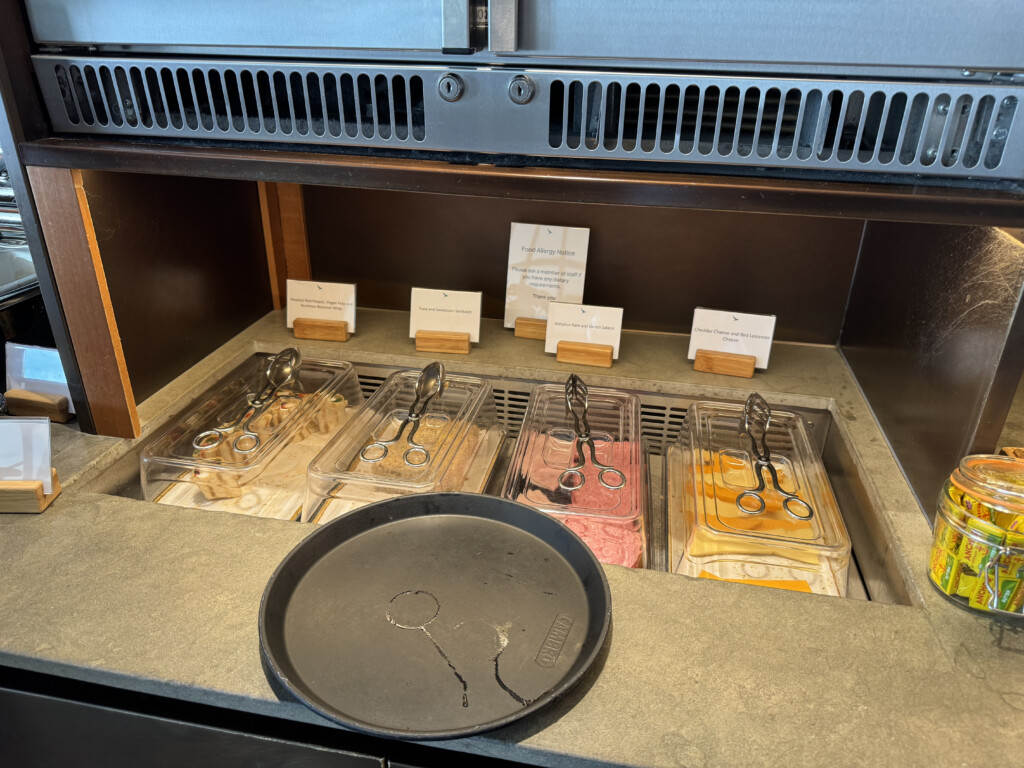 a trays of food in a cabinet