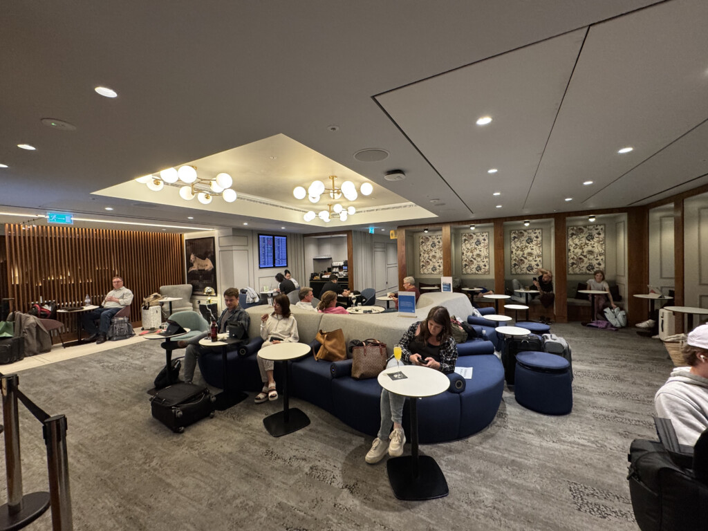 a group of people sitting in a lounge area