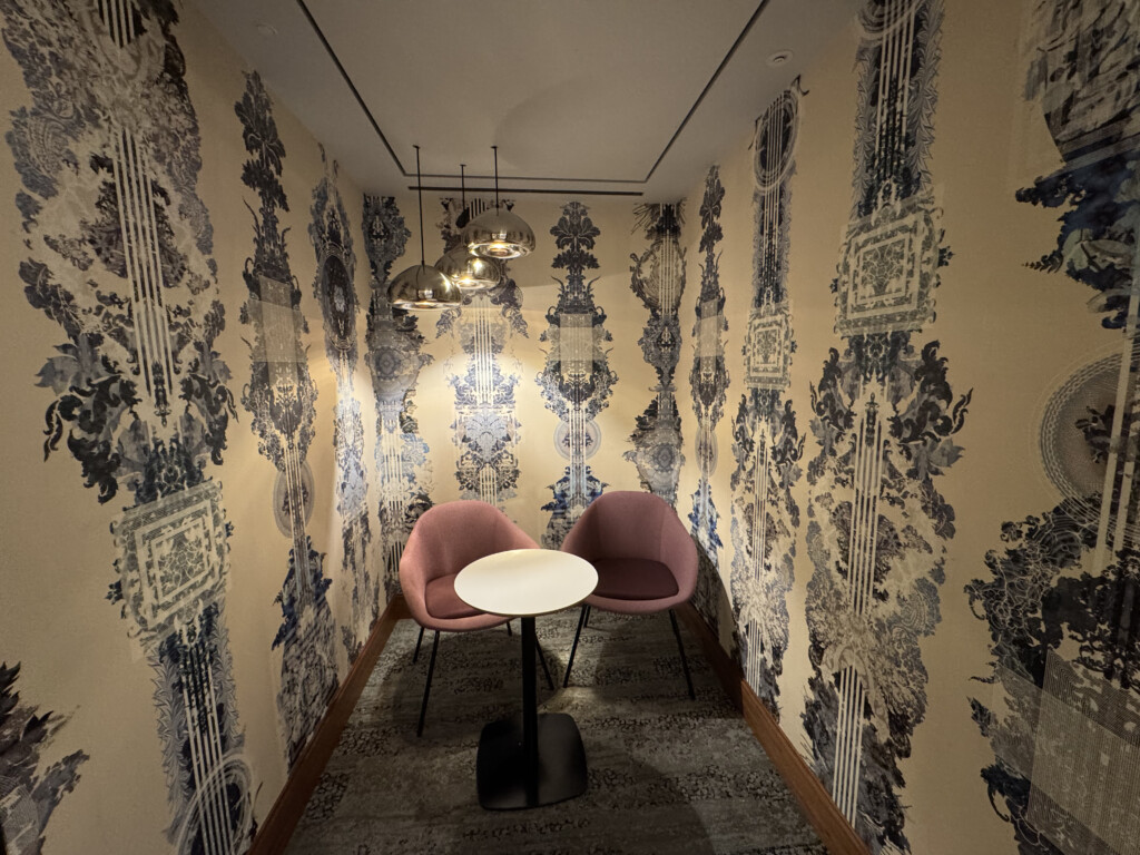a room with a table and chairs