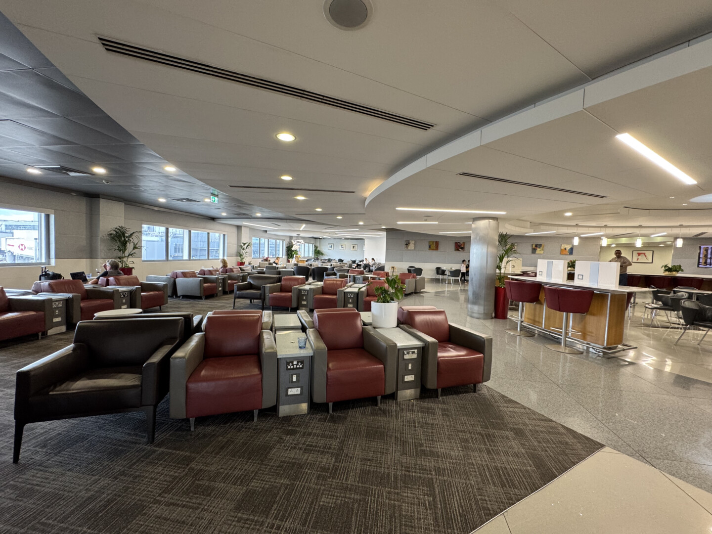 a large room with chairs and tables