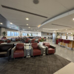 a large room with chairs and tables