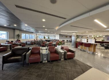 a large room with chairs and tables