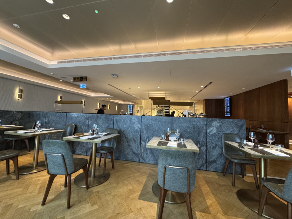 a restaurant with tables and chairs