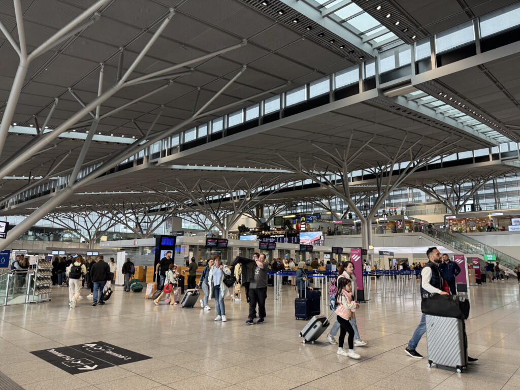 a group of people in an airport