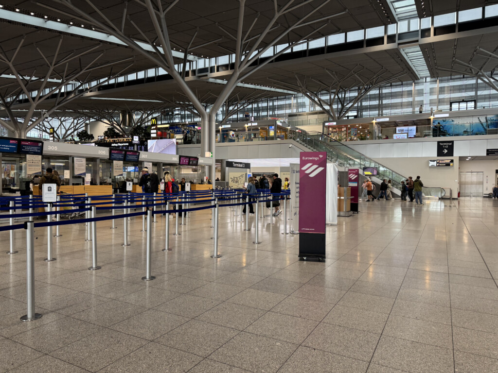 a group of people in a large airport
