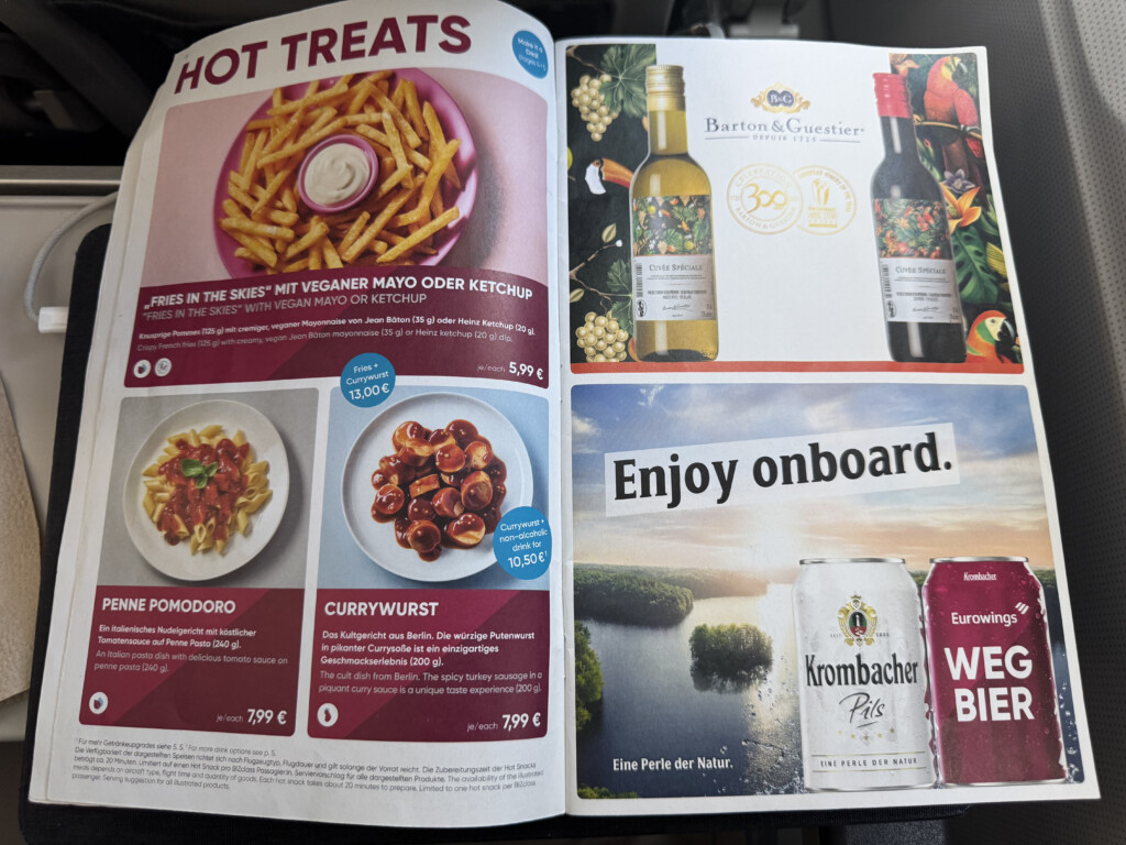 an open book with images of food and drinks