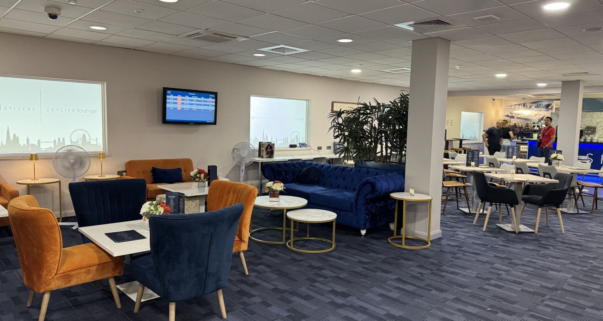 a room with tables and chairs